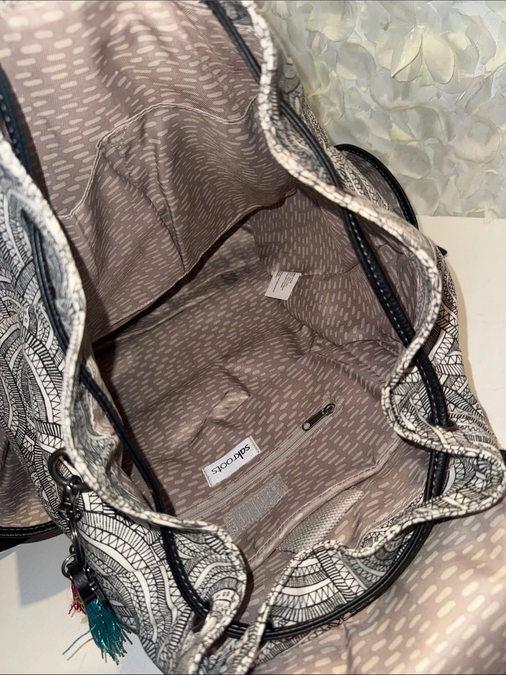 Sakroots Black & White Patterned Backpack with Multicolor Embroidered Circle